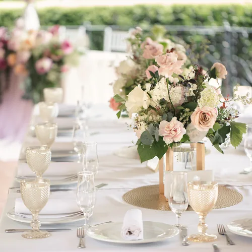 Elegant reception table with floral centerpiece